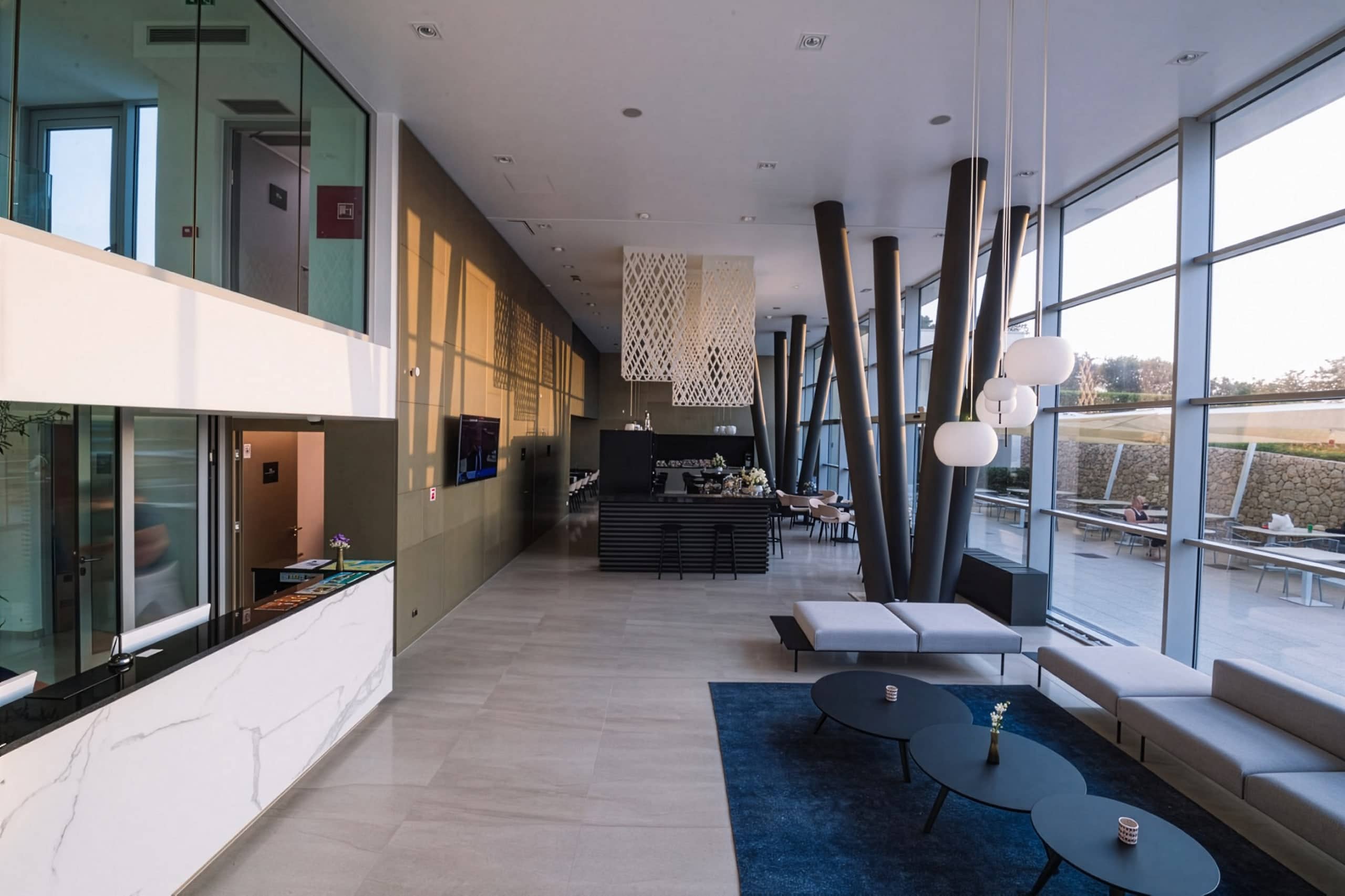 Hotel bar with Kushi Suspension lamp — Joel Hotel, Croatia — KDLN